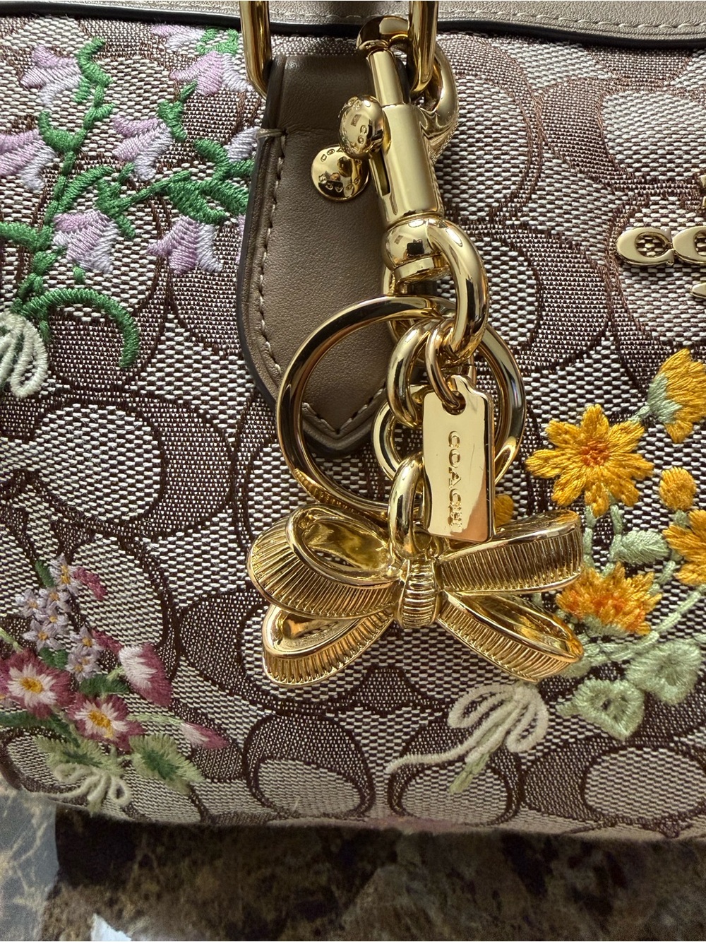 COACH Gold Bow Key Ring Charm with Signature Tag